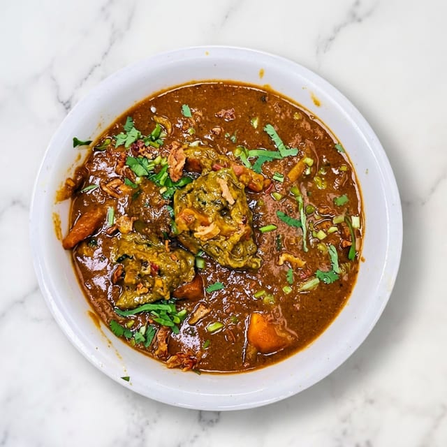 Achari Lamb.